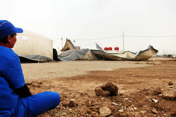 Nahla rues the health centre tents destroyed by a storm
